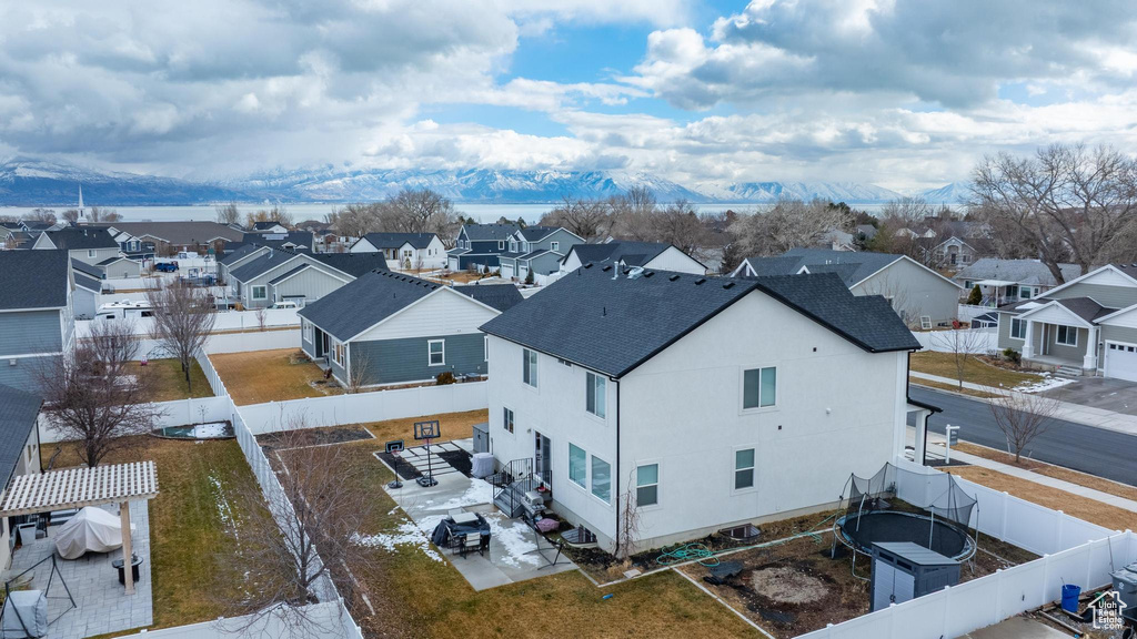 Drone / aerial view featuring a mountain view and a residential view