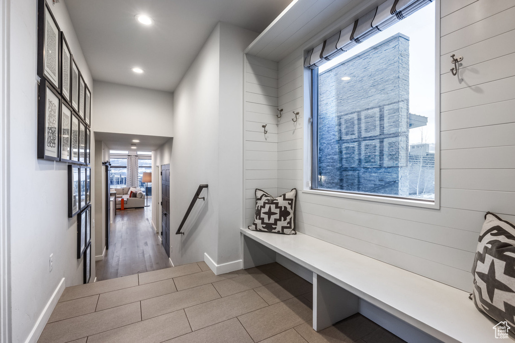Mudroom with recessed lighting and baseboards