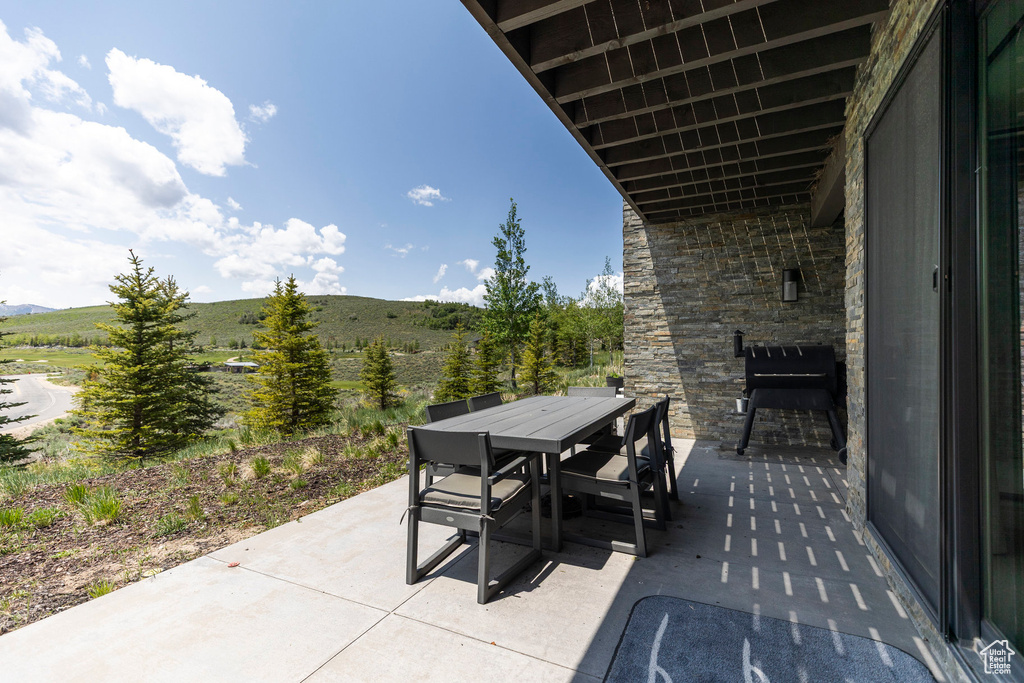 View of patio featuring outdoor dining area