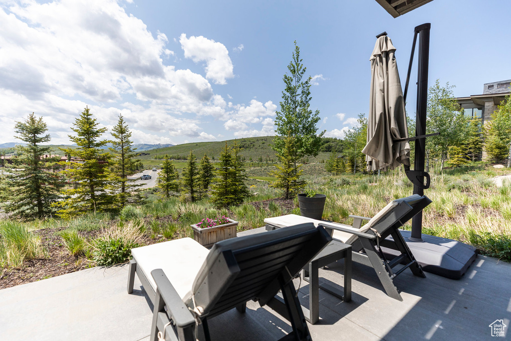 View of patio / terrace featuring a mountain view