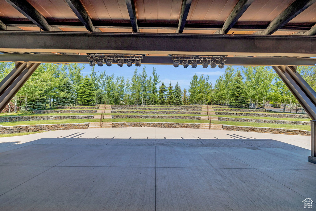 View of patio / terrace with view of wooded area