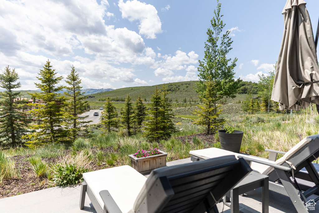 View of patio / terrace with a mountain view