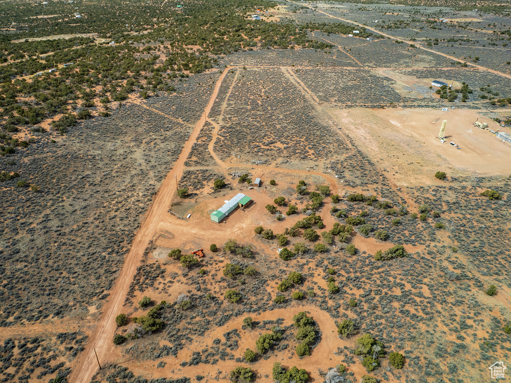 Birds eye view of property featuring a rural view