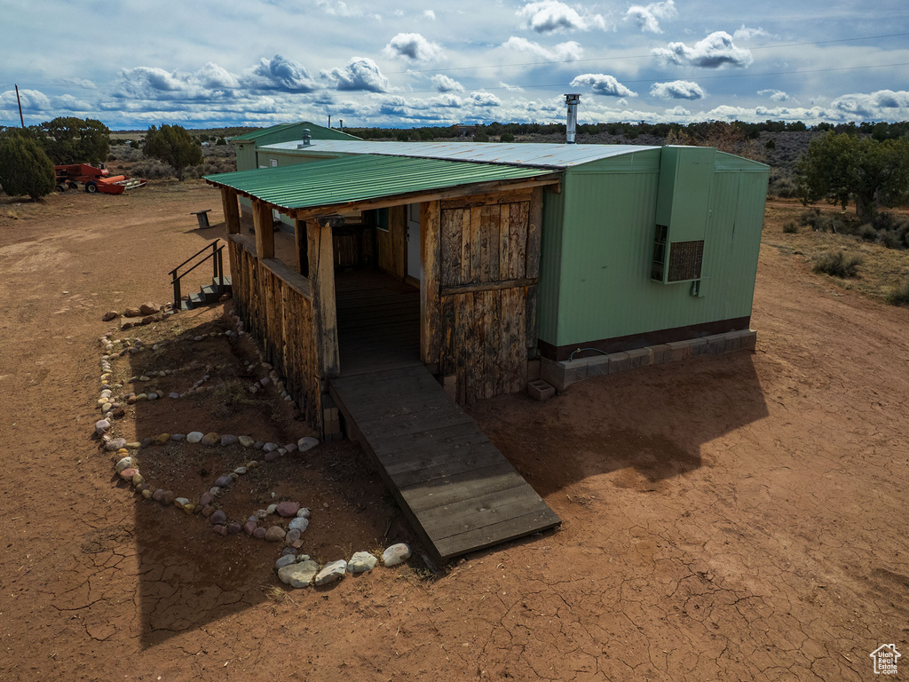 View of home\'s exterior with metal roof