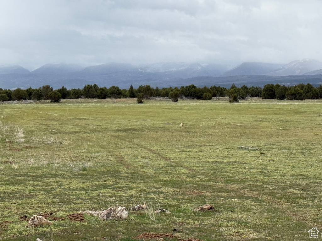 View of landscape with a rural view and a mountain view