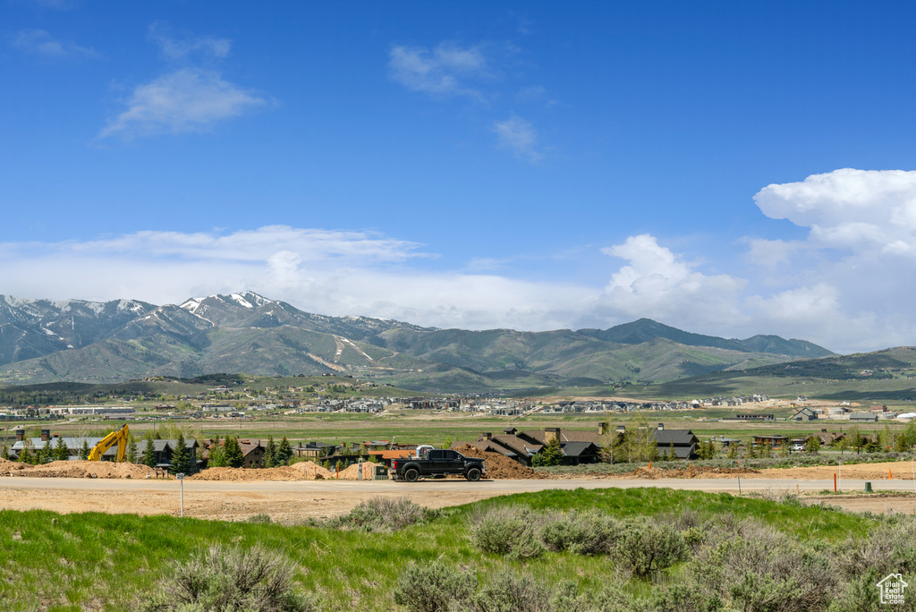 View of mountain backdrop featuring rural landscape