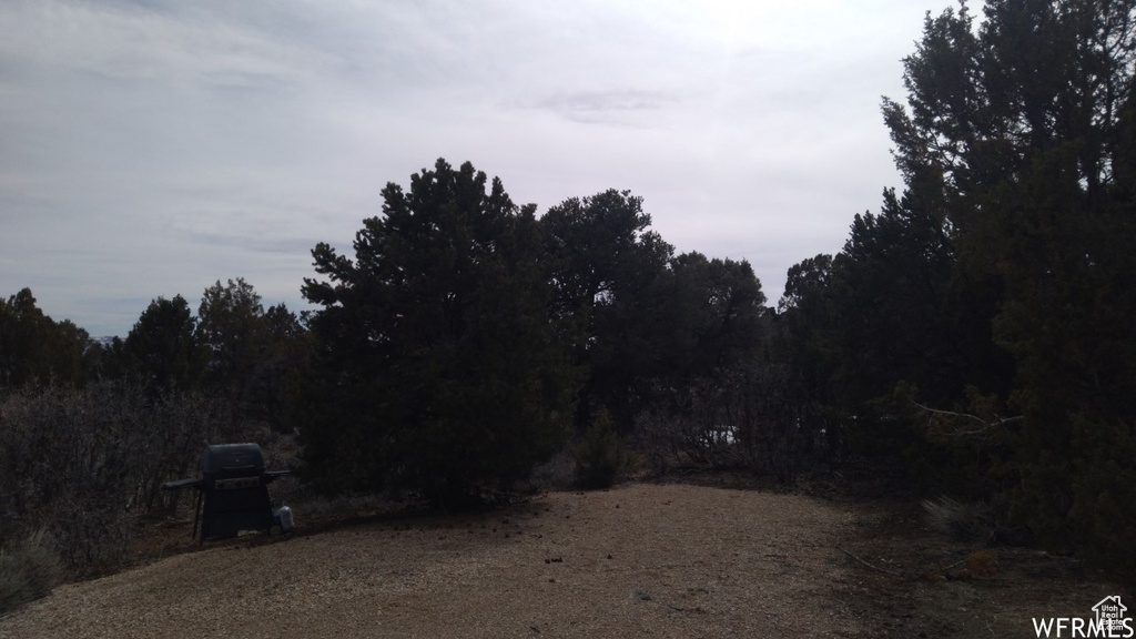 Exterior space featuring a view of trees