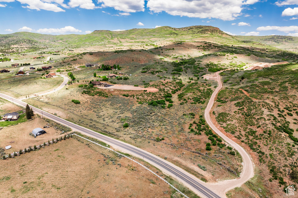 Aerial overview of property's location with mountains