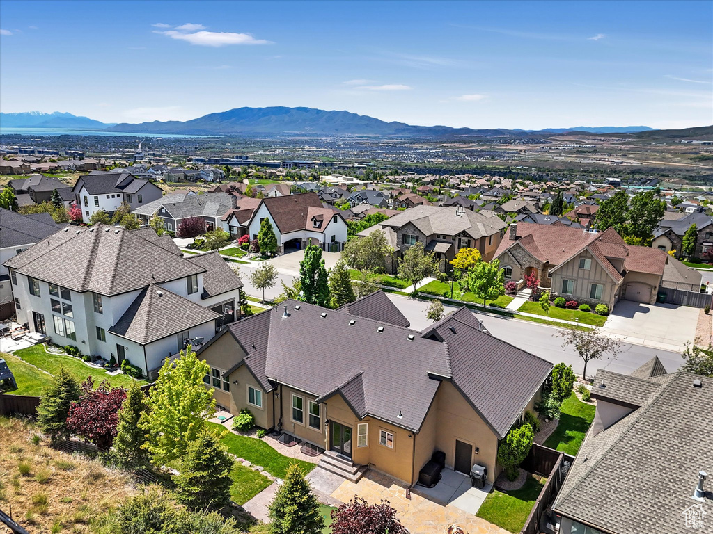 Aerial perspective of suburban area with mountains