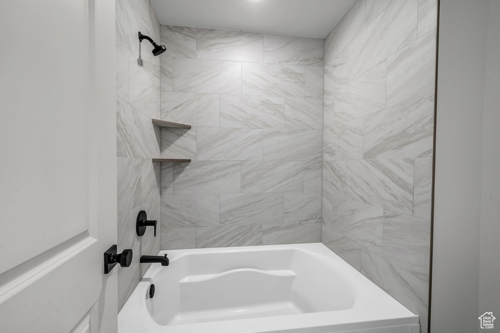 Bathroom with bathing tub / shower combination