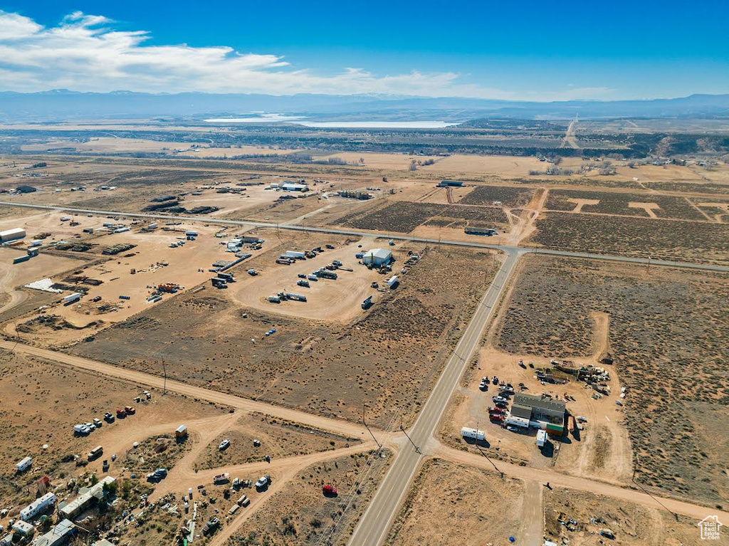 Bird's eye view featuring view of desert and a rural view