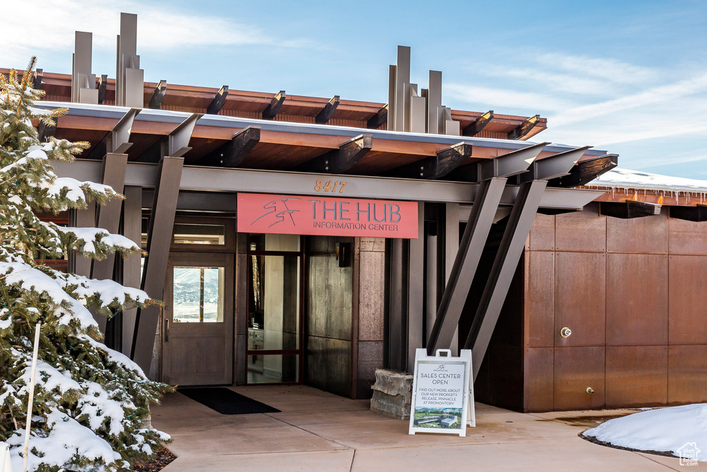 View of snow covered property entrance