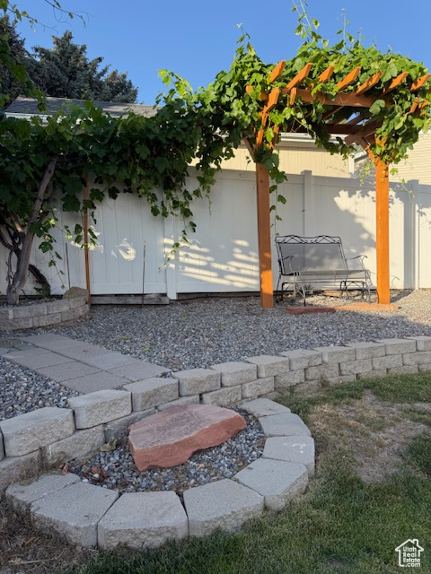 View of side of home featuring a patio