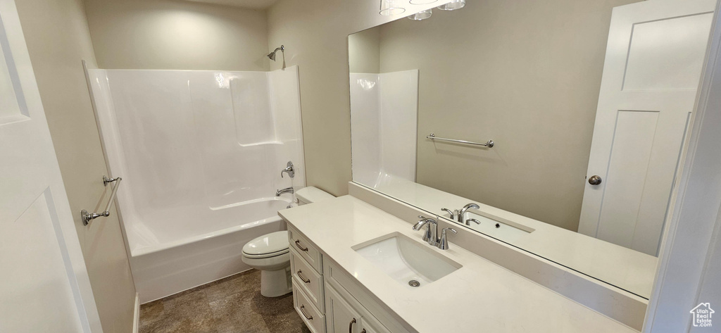 Full bath featuring vanity, washtub / shower combination, and toilet