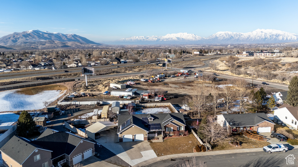 Drone / aerial view featuring a residential view and a mountain view