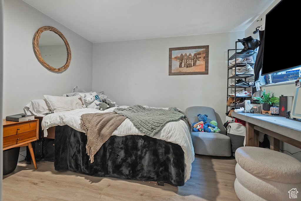 Bedroom featuring wood finished floors