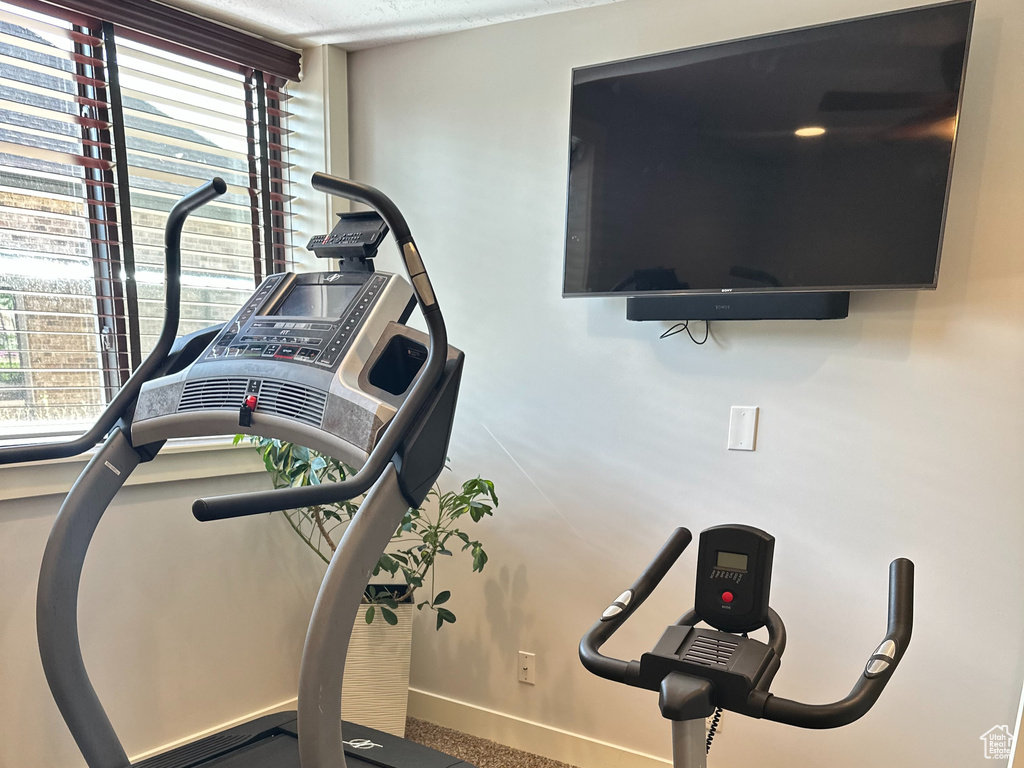 Exercise room featuring baseboards