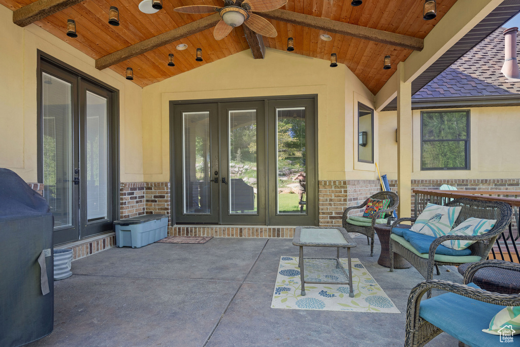 View of patio featuring a ceiling fan and french doors