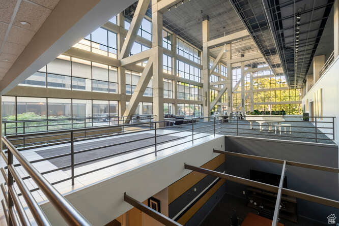 Stairway with a high ceiling and plenty of natural light