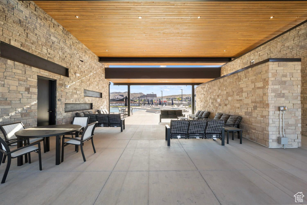 View of patio featuring outdoor dining area and an outdoor living space