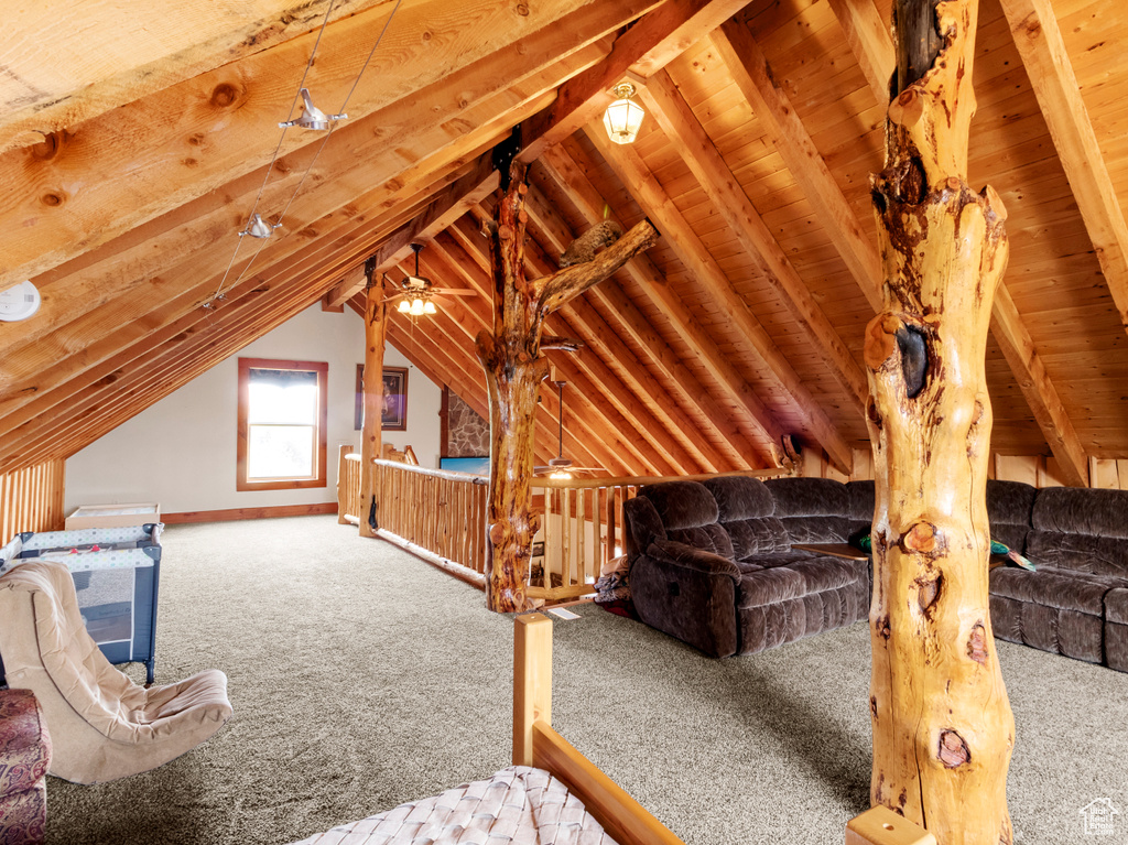 Attic featuring an upstairs landing