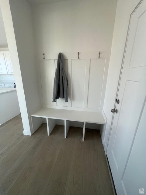 Mudroom with wood finished floors