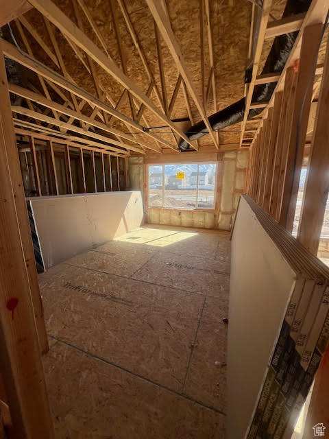 Miscellaneous room featuring vaulted ceiling