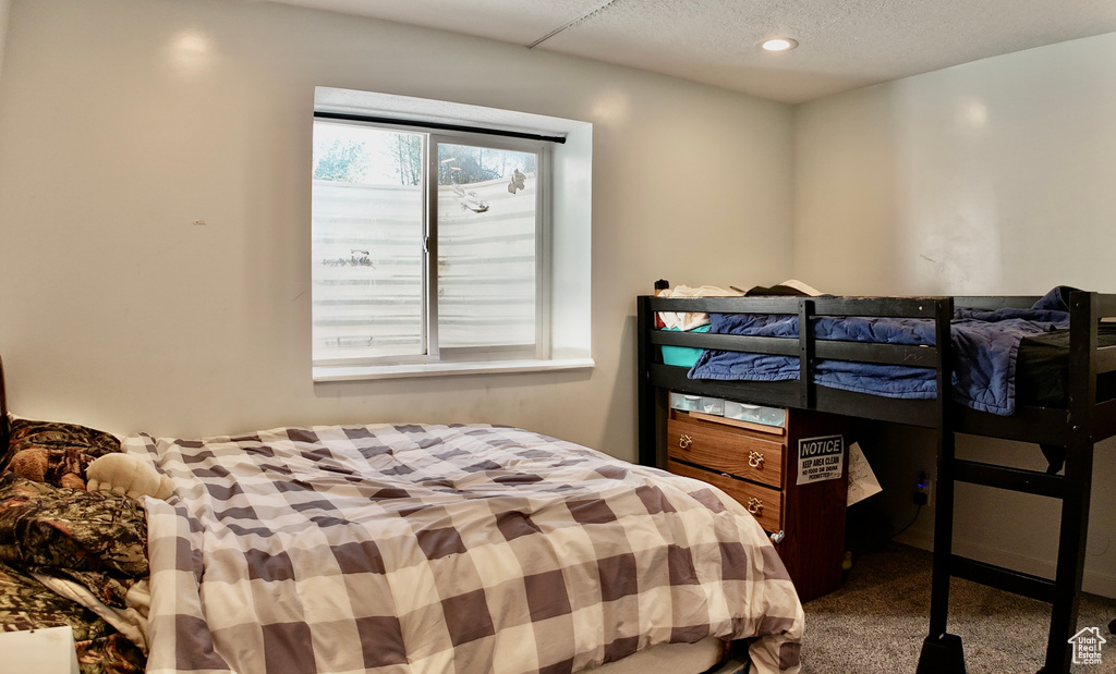 Bedroom featuring carpet flooring