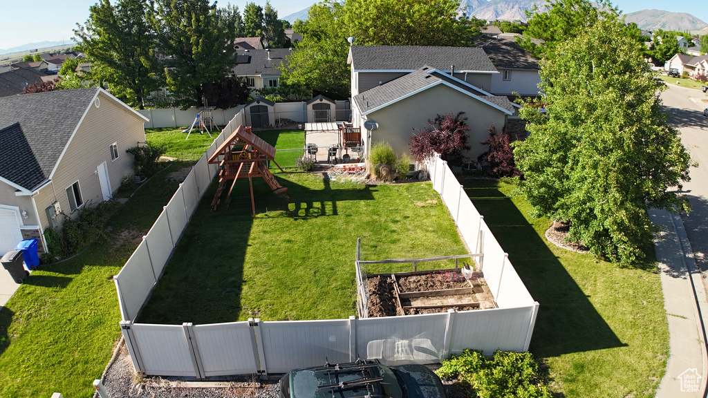 Aerial perspective of suburban area featuring mountains