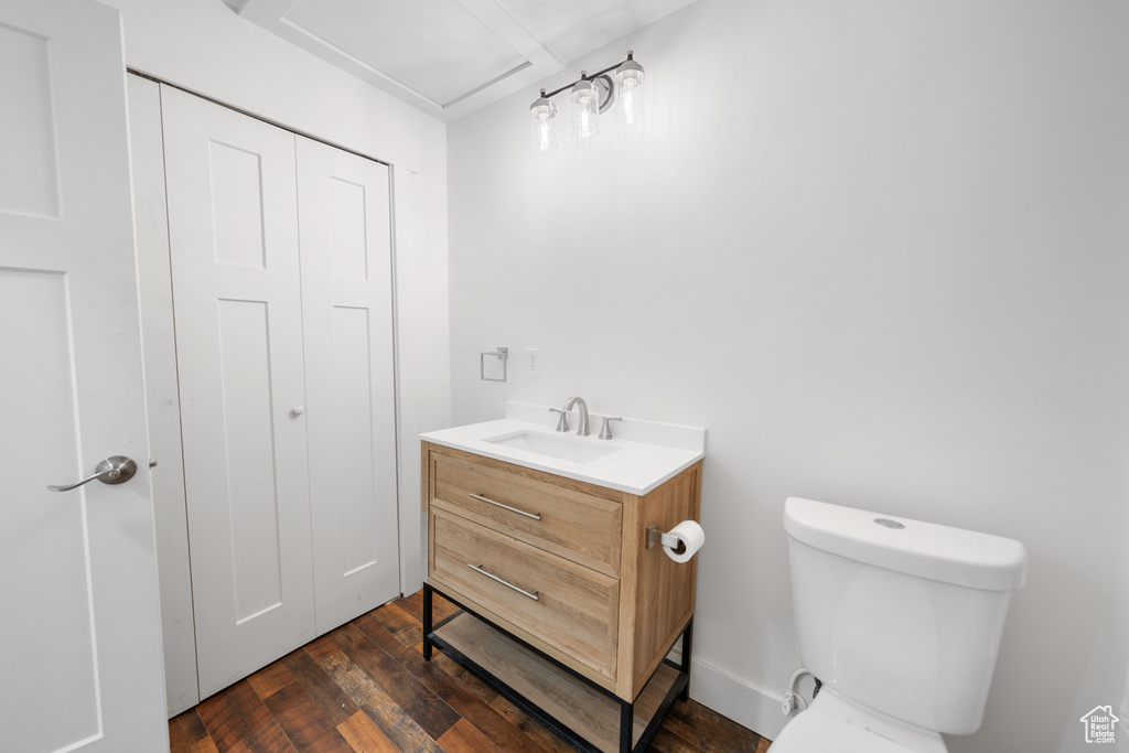 Bathroom with vanity and wood-type flooring