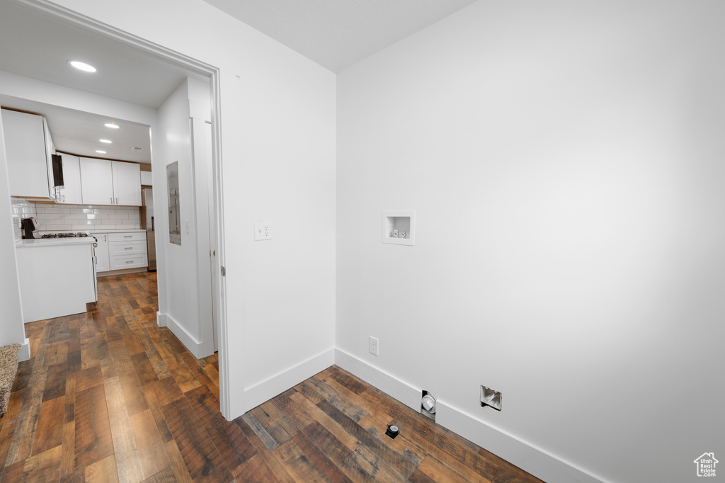 Laundry area featuring washer hookup, recessed lighting, and dark wood-type flooring