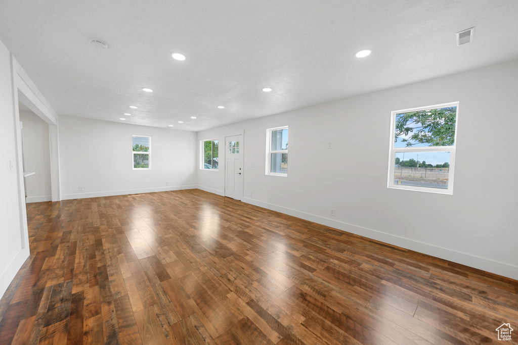 Unfurnished room featuring recessed lighting and hardwood / wood-style flooring