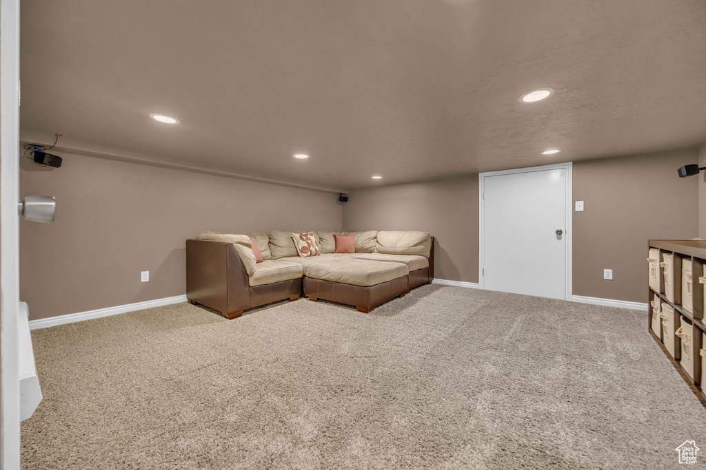 Living room featuring recessed lighting, carpet floors, and baseboards