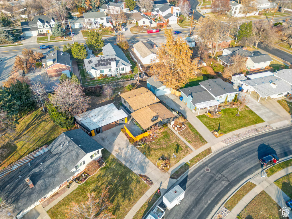 Aerial view of property\'s location featuring nearby suburban area