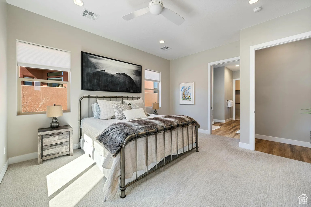 Bedroom featuring recessed lighting, visible vents, carpet flooring, and baseboards
