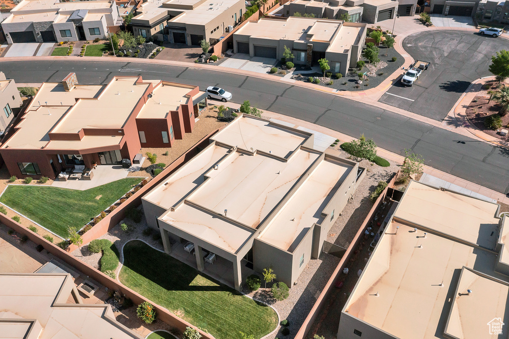 Birds eye view of property with a residential view