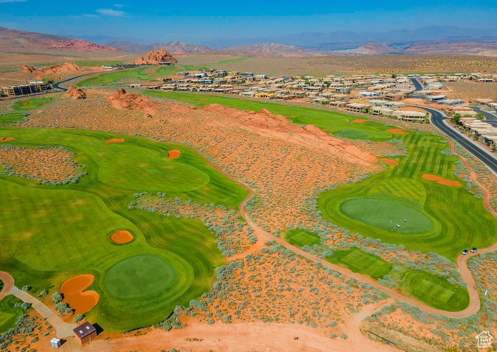 Birds eye view of property featuring a residential view, a mountain view, and view of golf course