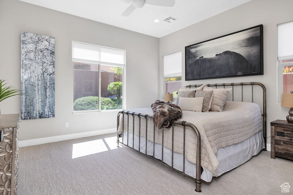 Bedroom with carpet flooring, visible vents, baseboards, recessed lighting, and a ceiling fan