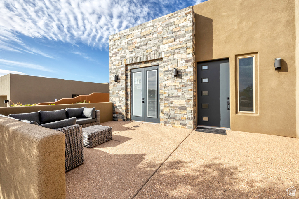 View of patio with outdoor lounge area