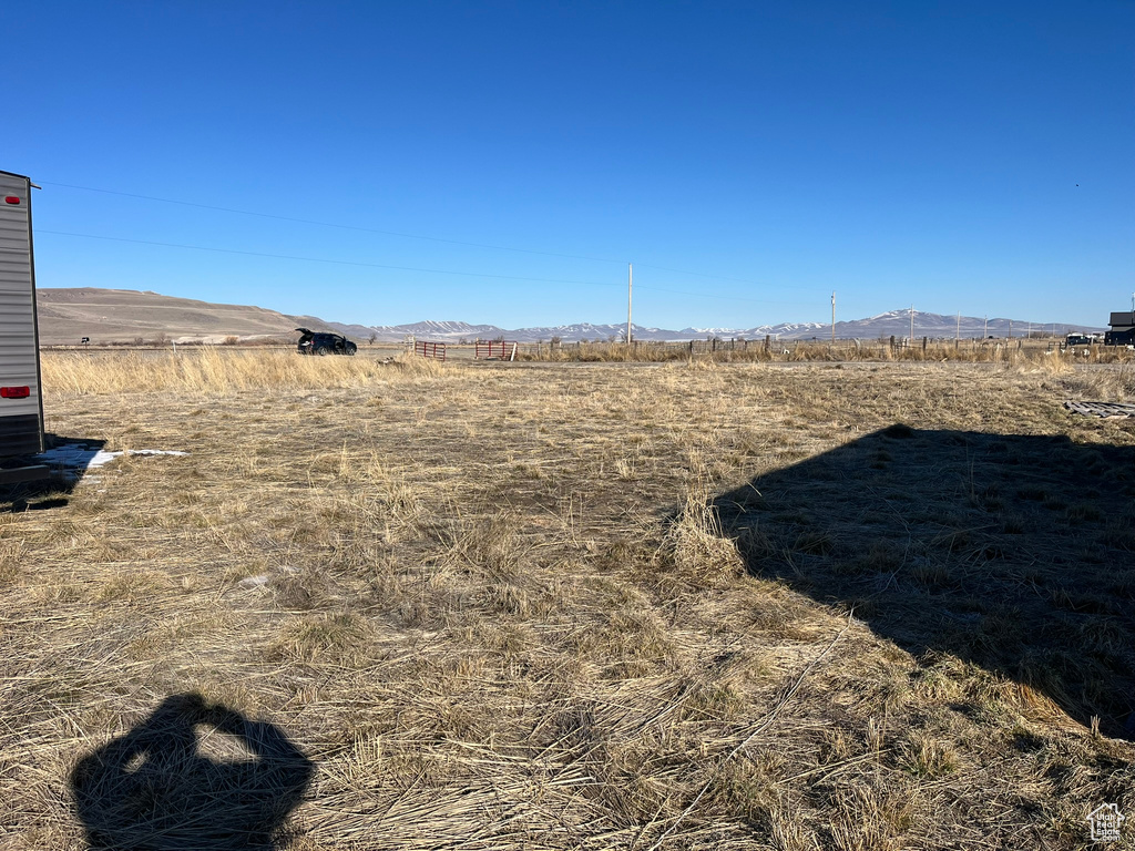 View of yard with a mountain view