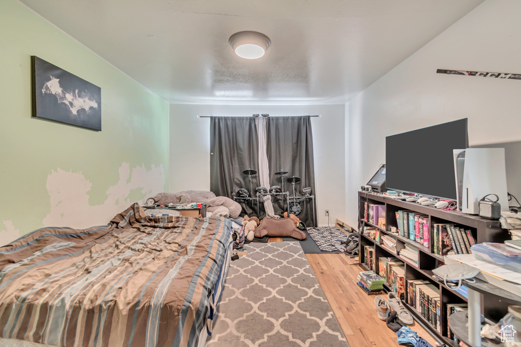 Bedroom with wood finished floors