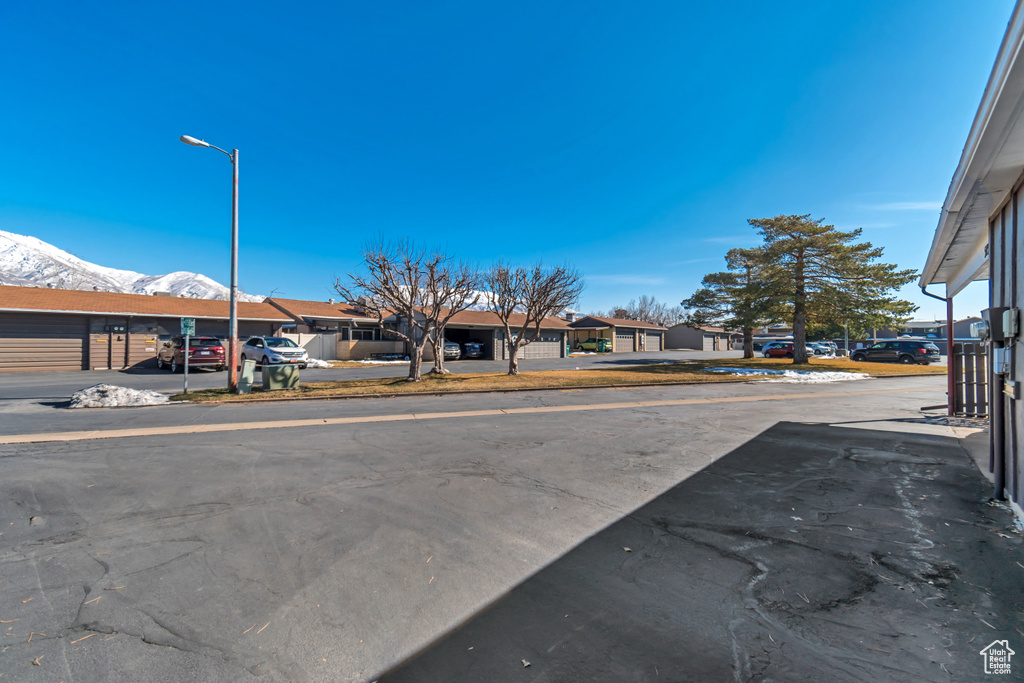 View of road featuring street lighting and a residential view