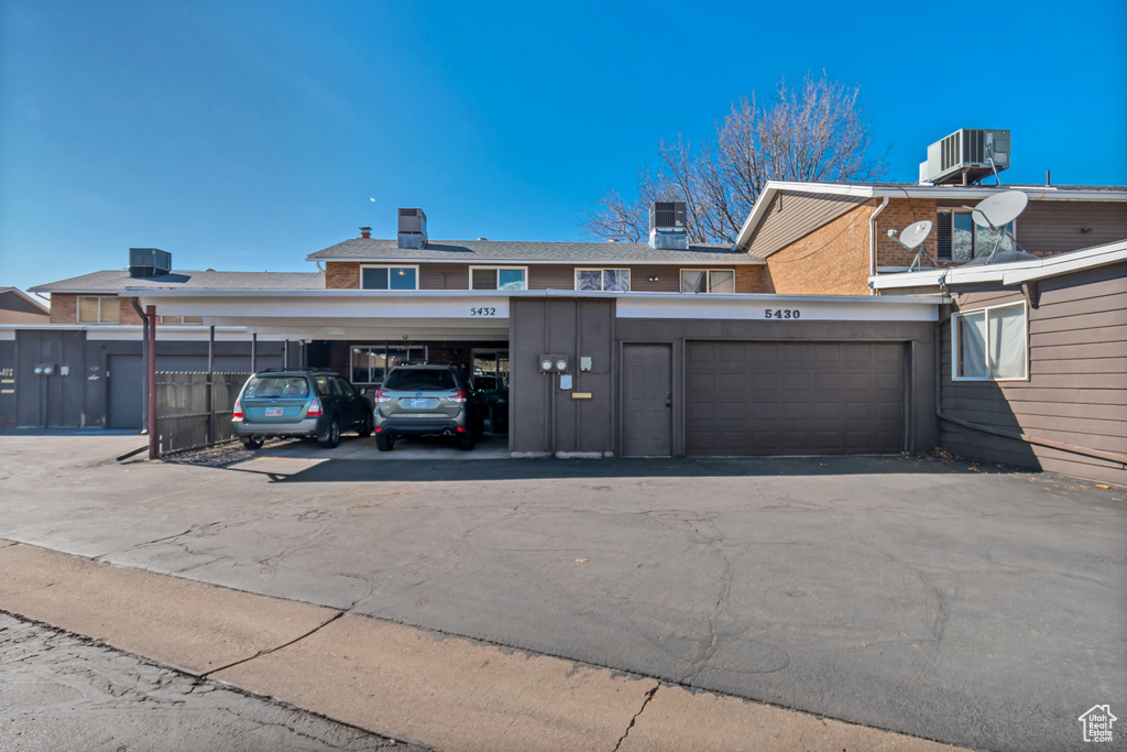 Garage featuring central AC unit