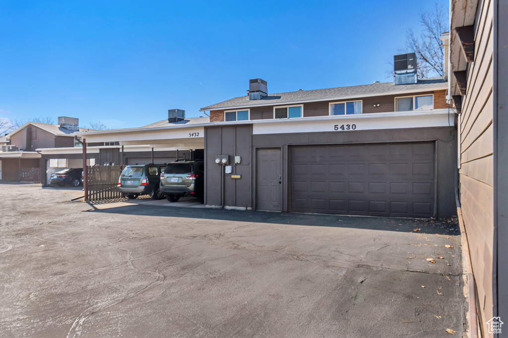 Garage featuring central AC unit