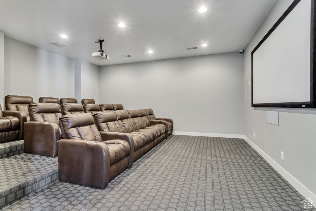 Carpeted cinema featuring recessed lighting, visible vents, and baseboards