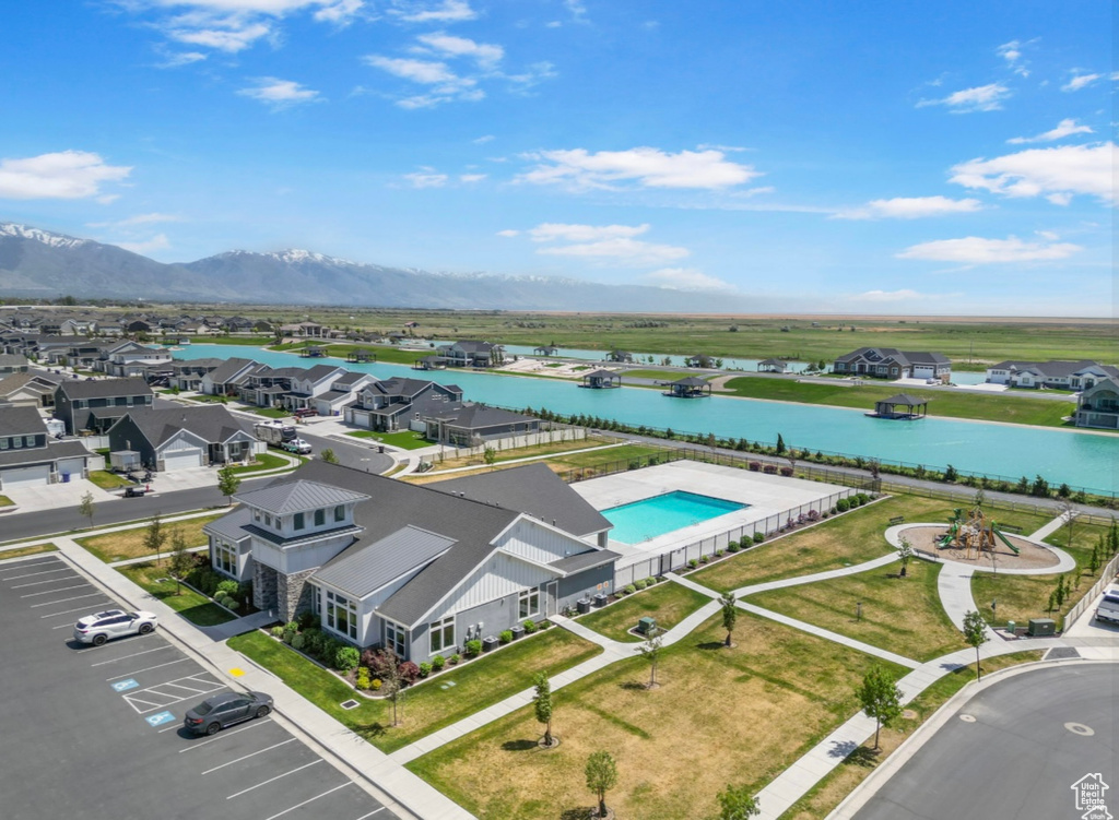 Bird\\\\\\\'s eye view of a water and mountain view and a pool