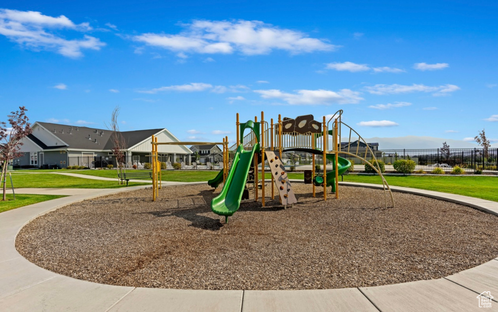 Community jungle gym featuring a residential view
