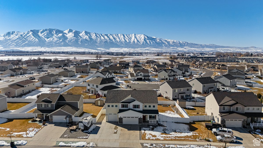 Exterior space featuring a residential view and a mountain view
