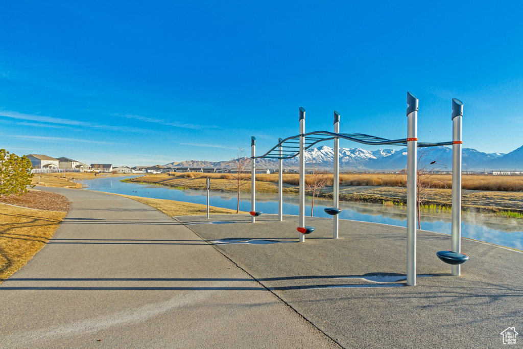 View of home\'s community featuring a water view