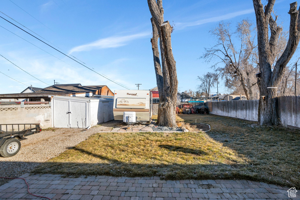 View of yard featuring fence